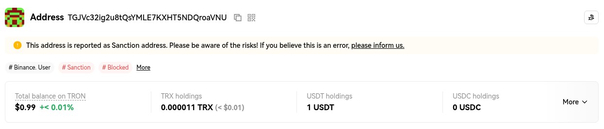 OKLink TRON explorer header for address TGJVc32ig2u8tQsYMLE7KXHT5NDQroaVNU showing a warning that the address is reported as a sanction address and tags reading Binance. User, Sanction and Blocked, with a 1 USDT balance