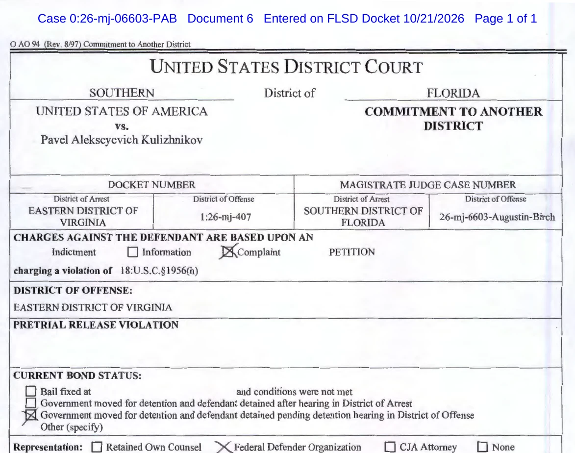 Commitment to Another District form dated October 21, 2026, committing Pavel Alekseyevich Kulizhnikov to the Eastern District of Virginia on a complaint charging 18 U.S.C. 1956(h).