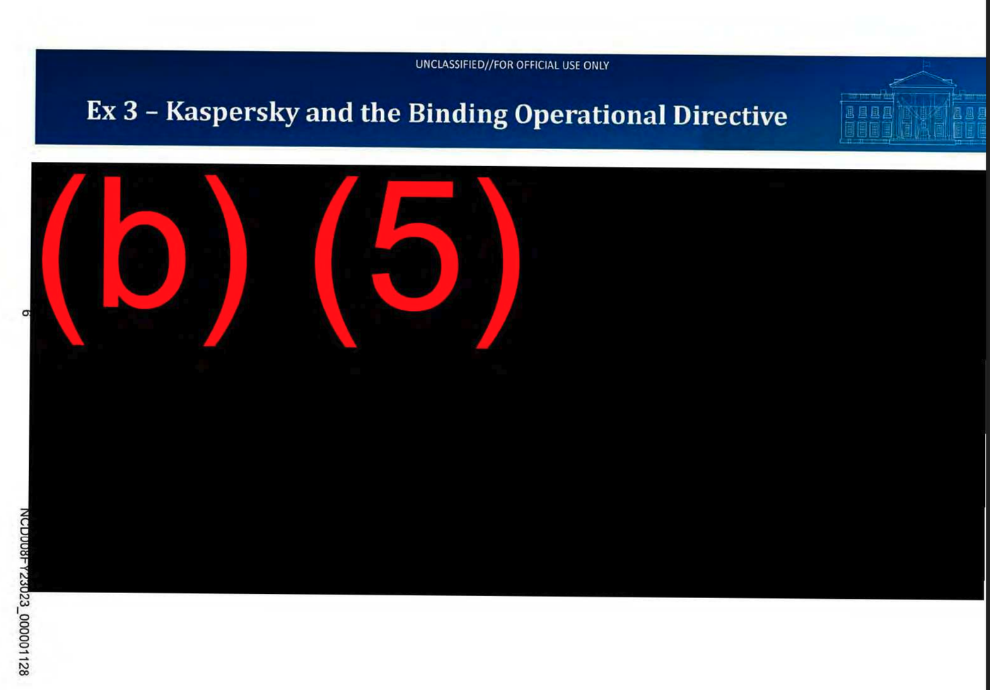 Slide titled Ex 3 – Kaspersky and the Binding Operational Directive under an Unclassified, For Official Use Only banner. The body is a black box marked (b)(5) in red; the slide number 6 and Bates number NCD008FY23023_000001128 run along the left edge.